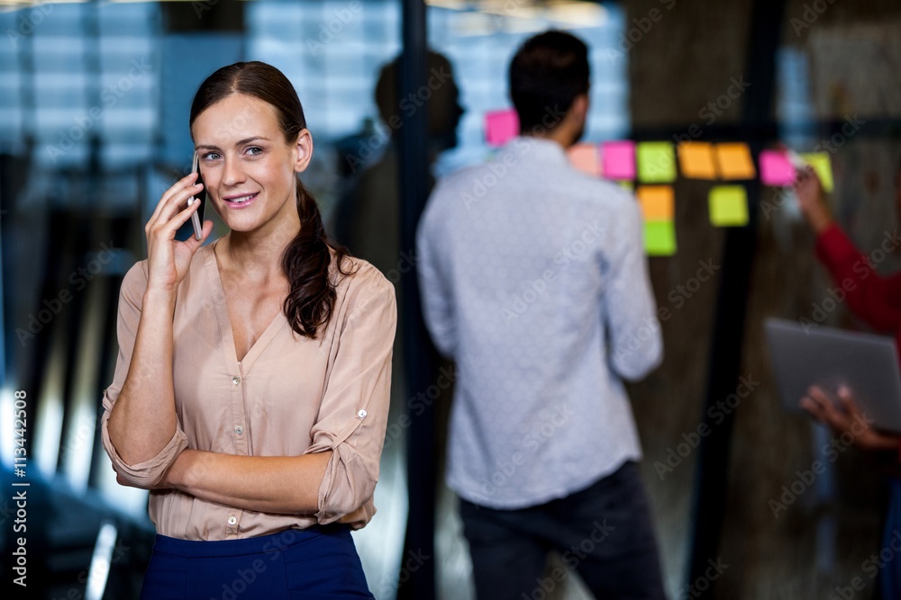 Focus on foreground of businesswoman calling Focus on foreground of businesswoman calling