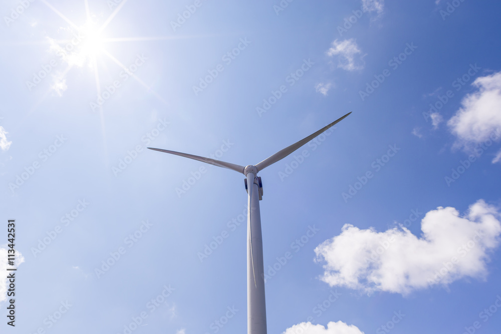 Windmill on a blue sky