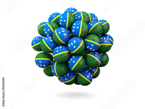 Pile of footballs with flag of solomon islands