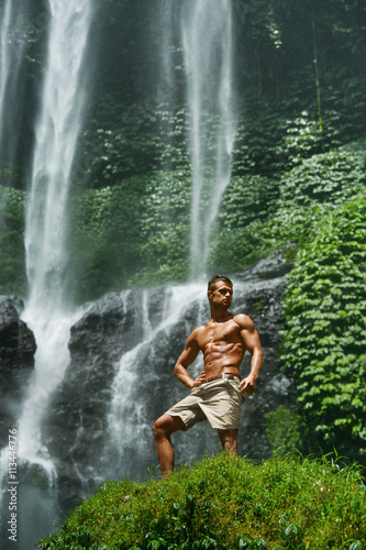 Water. Healthy Man With Sexy Body Near Waterfall. Healthcare