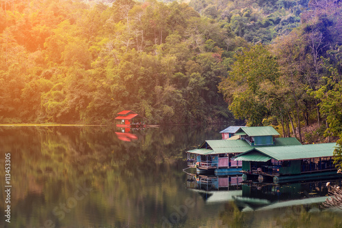 Houseboats in the dam of thailand. photo