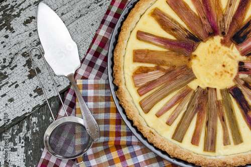 rhubarb pie on rustic background