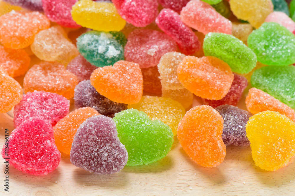 Colourful sugary candy on the table, Multicolour sugary candy for background, Colourful heart shape sugary candy Colourful sugary candy on the table, Multicolour sugary candy for background, Colourful heart shape sugary candy