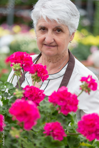 senior woman gardening © eric