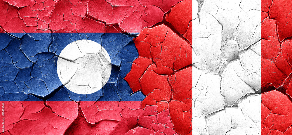 Laos flag with Peru flag on a grunge cracked wall