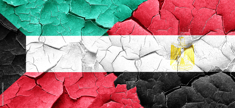 Kuwait flag with egypt flag on a grunge cracked wall