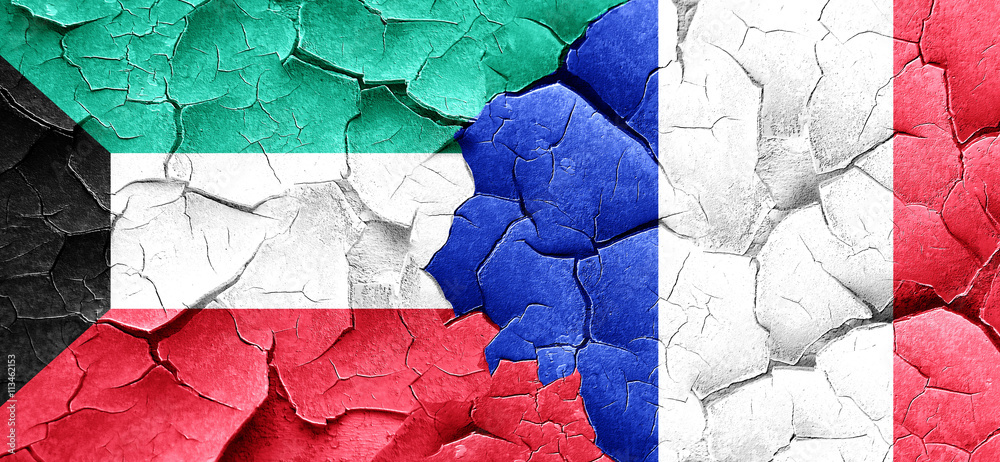 Kuwait flag with France flag on a grunge cracked wall Kuwait flag with France flag on a grunge cracked wall