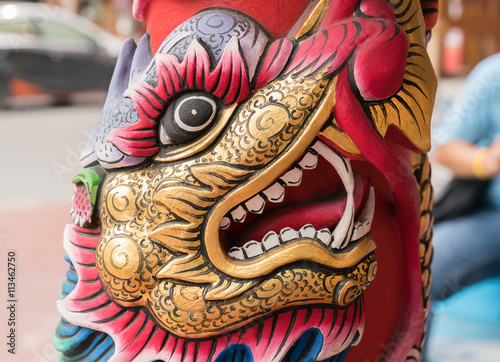 Dragon statue on pillar at chinese temple   © praphab144