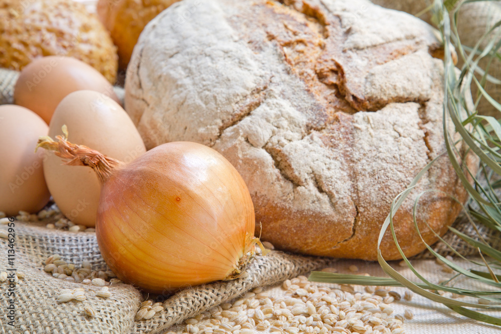 Wheat bread, eggs on sacking