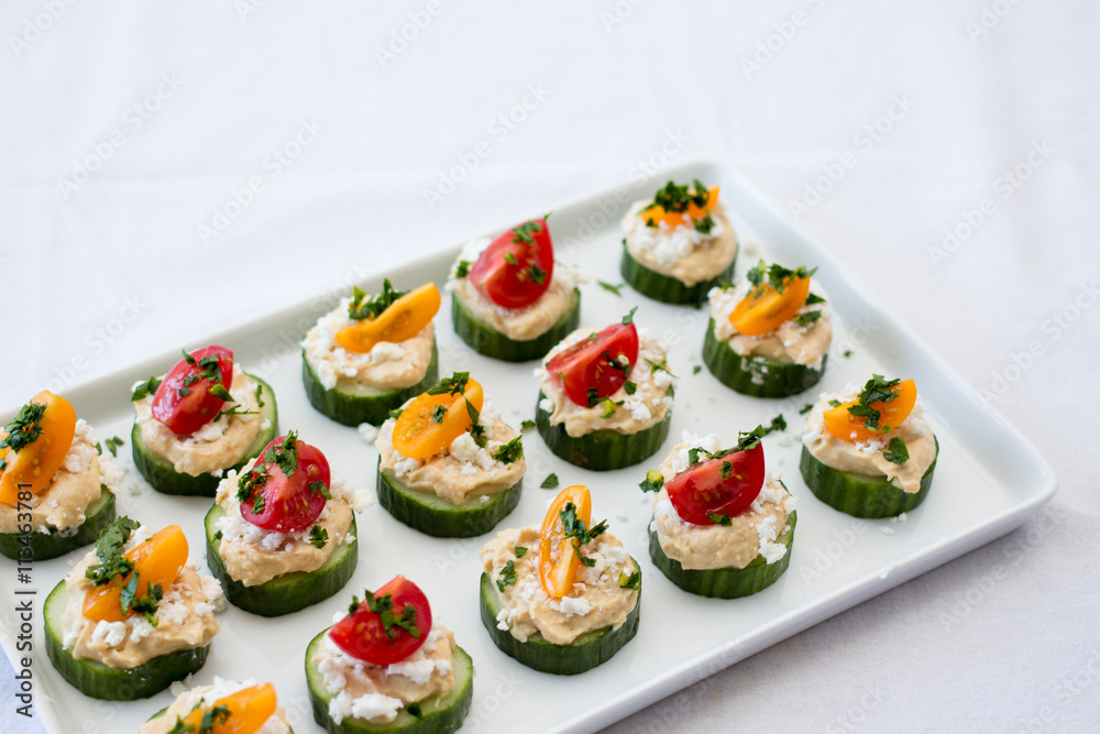 hummus bites with cucumber and tomatoes hummus bites with cucumber and tomatoes