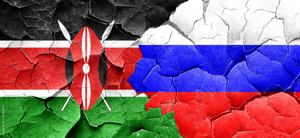 Kenya flag with Russia flag on a grunge cracked wall