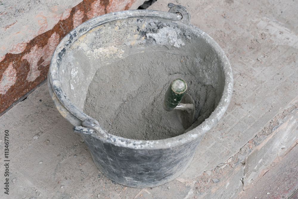 Buckets of cement.
Buckets of cement.