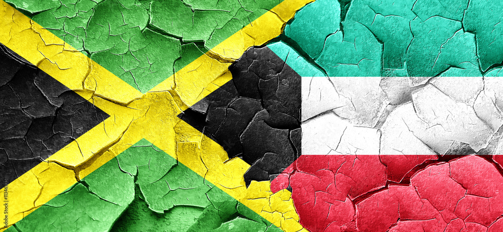 Jamaica flag with Kuwait flag on a grunge cracked wall