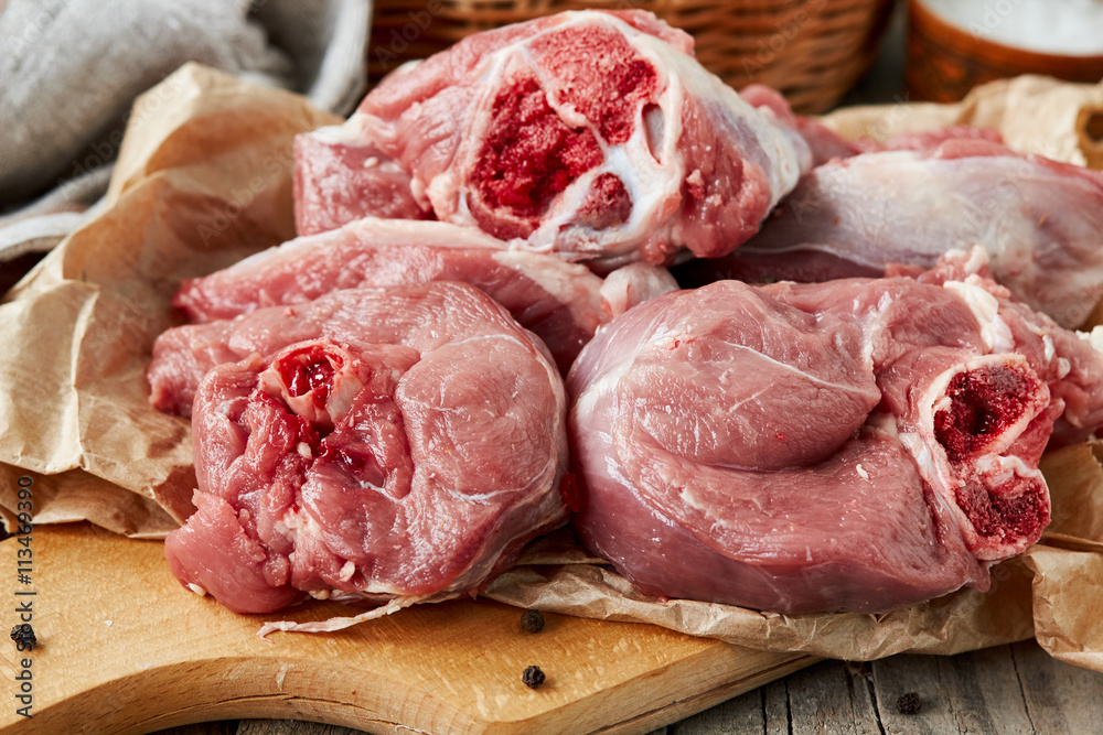 Fresh raw mutton on cutting board