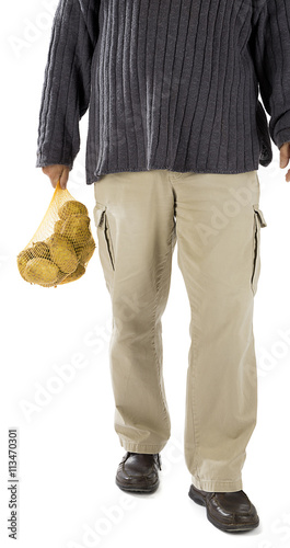 Man Walking with String Bag on Hand 