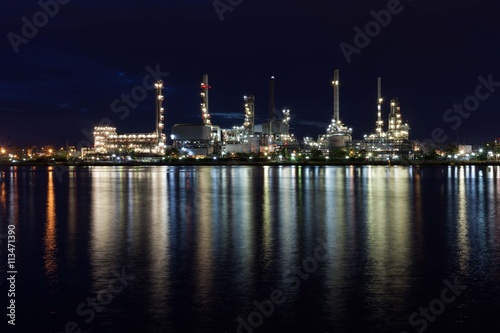 Beautiful light of oil refinery factory in night time.
