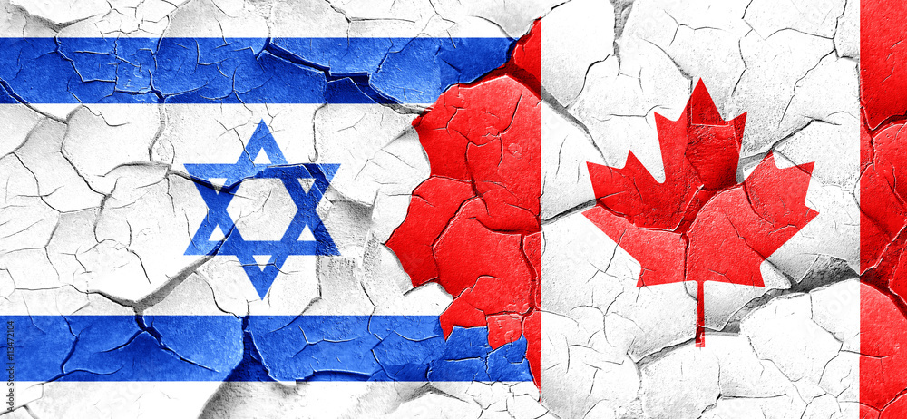 Israel flag with Canada flag on a grunge cracked wall Israel flag with Canada flag on a grunge cracked wall