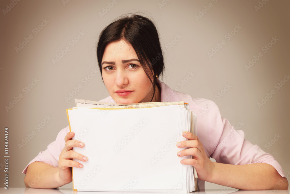 tired and exhausted woman working with documents (psychologica tired and exhausted woman working with documents (psychologica