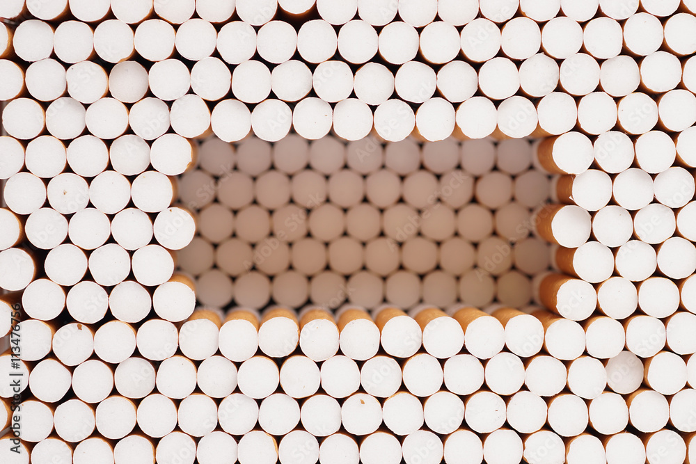 Full frame of cigarette filters as background or texture