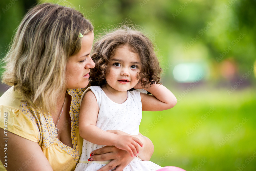 Happy mother and daughter with embracing, close up portrait. Happy mother and daughter with embracing, close up portrait.