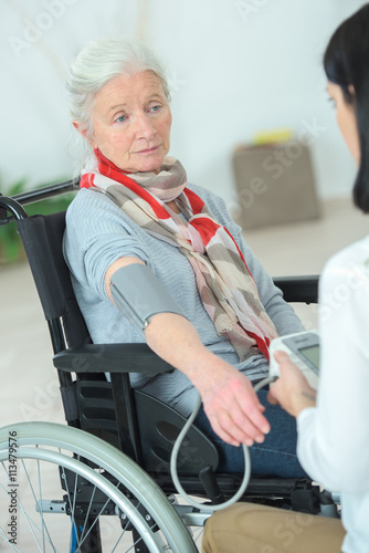 taking blood pressure