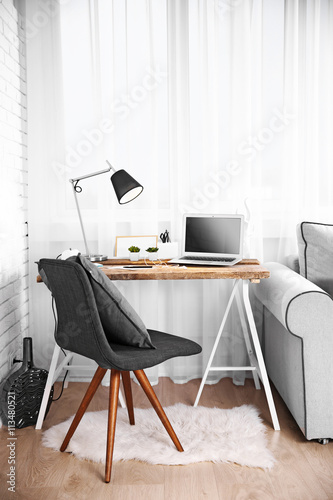 Modern workplace on light b...