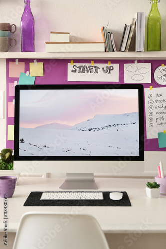 Stylish workplace with comp...