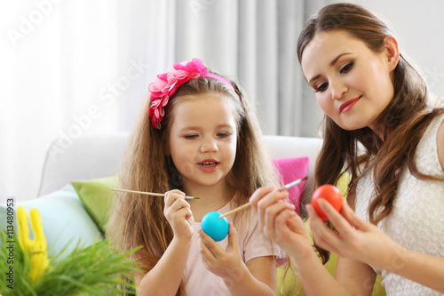 Mother and daughter decorat...