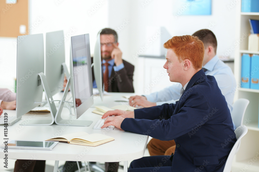 Young engineers working in the office