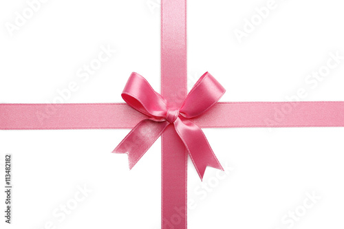 Pink ribbon bow on white background