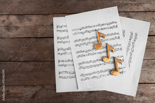 Golden music notes and shee...