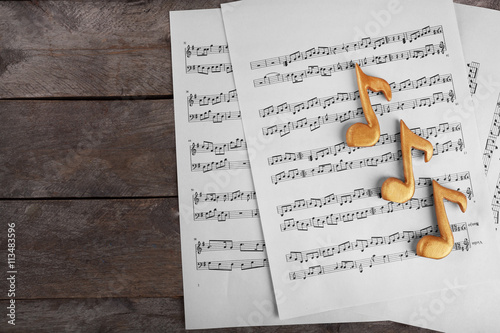 Golden music notes and shee...