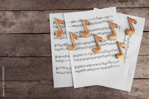 Golden music notes and shee...