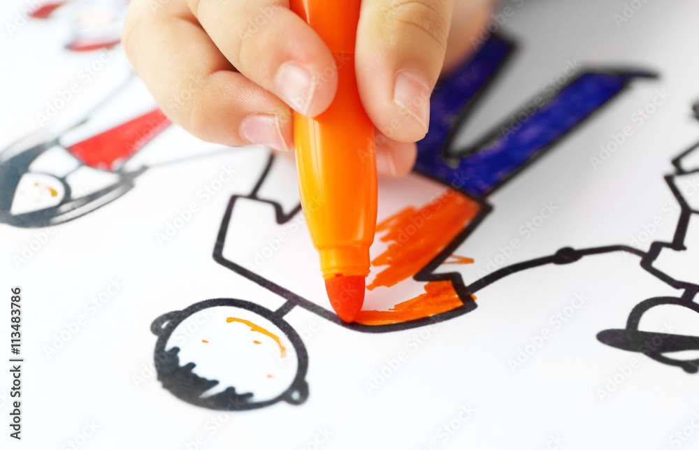 Small girl painting on cute picture