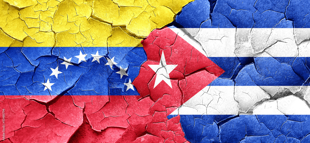 Venezuela flag with cuba flag on a grunge cracked wall Venezuela flag with cuba flag on a grunge cracked wall