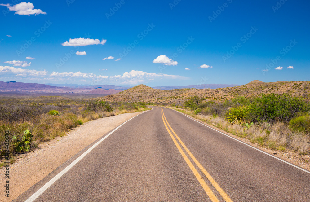 Beautiful cinematic view of the road under the blue cloudless sky in America