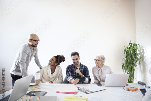 Business people collaborating in meeting