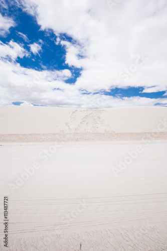 Beautiful cinematic deserted nature view under the blue cloudless sky in America. White sands.