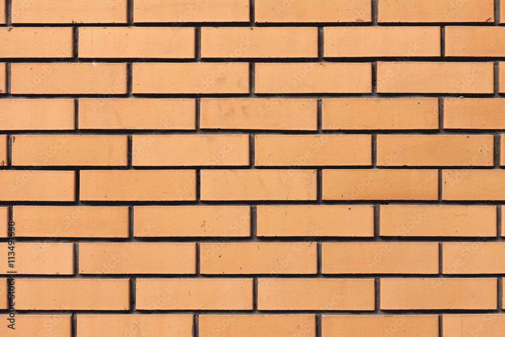 Yellow brick wall background Yellow brick wall background