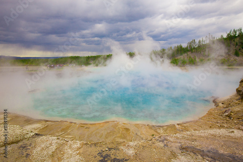 Beautiful cinematic view of nature landscape in the American West under the blue cloudy sky. Geyser.