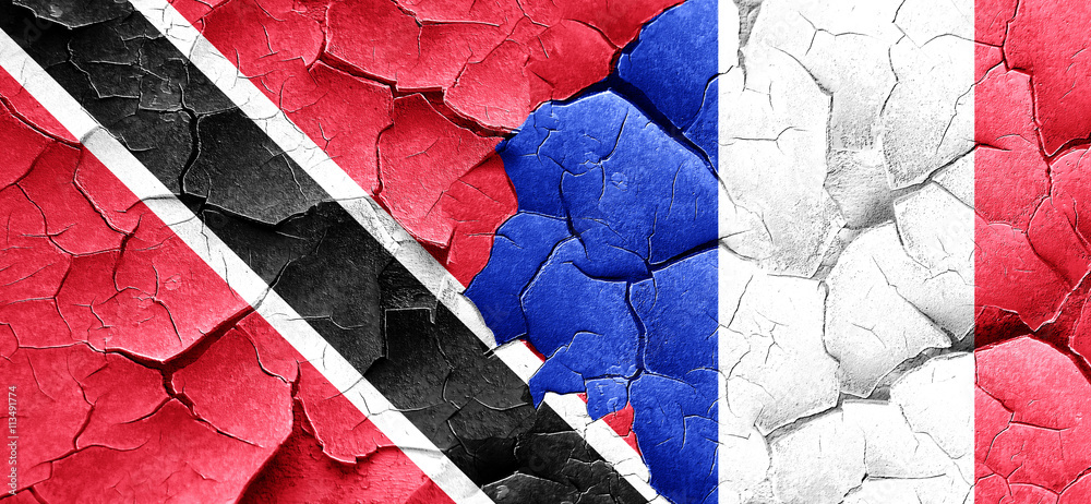 Trinidad and tobago flag with France flag on a grunge cracked wa