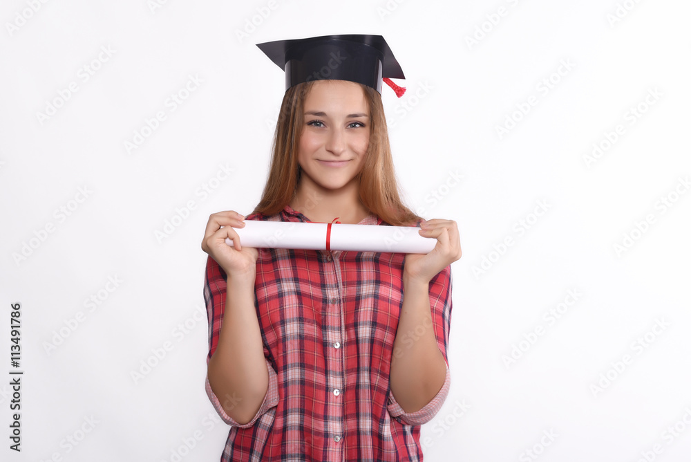 Student with diploma and graduation cap Student with diploma and graduation cap