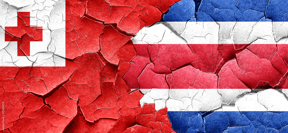 Tonga flag with Costa Rica flag on a grunge cracked wall Tonga flag with Costa Rica flag on a grunge cracked wall