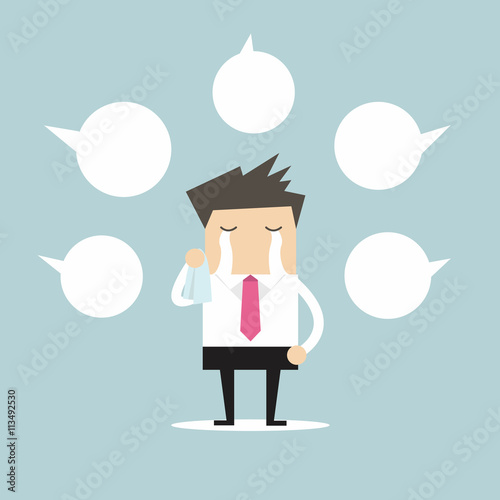 Businessman crying about negative comment with balloon text