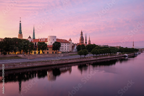 Lovely Riga early morning swimming in rising sun rays of light