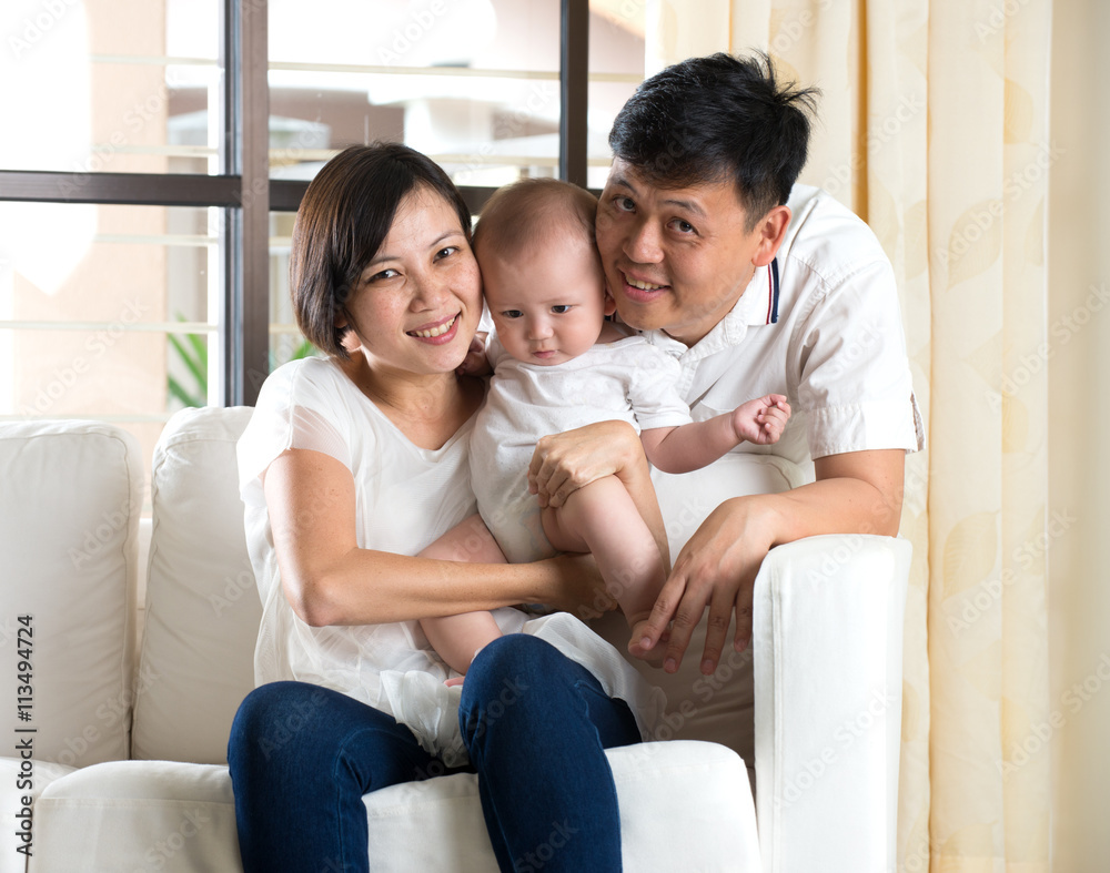 Happy Asian Family Playing with baby in the living room Happy Asian Family Playing with baby in the living room