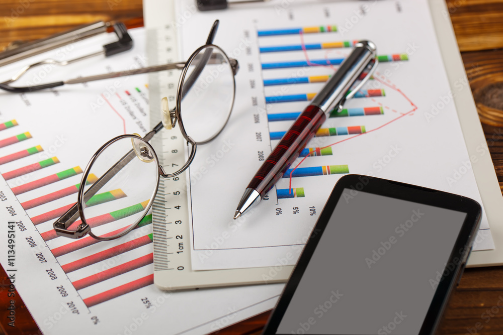 Business Objects office expanded in composition on a table Business Objects office expanded in composition on a table