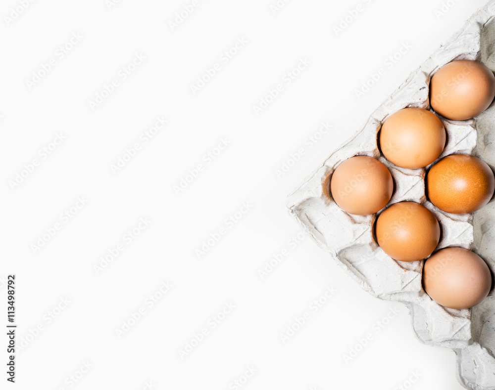 Top view of brown chicken eggs