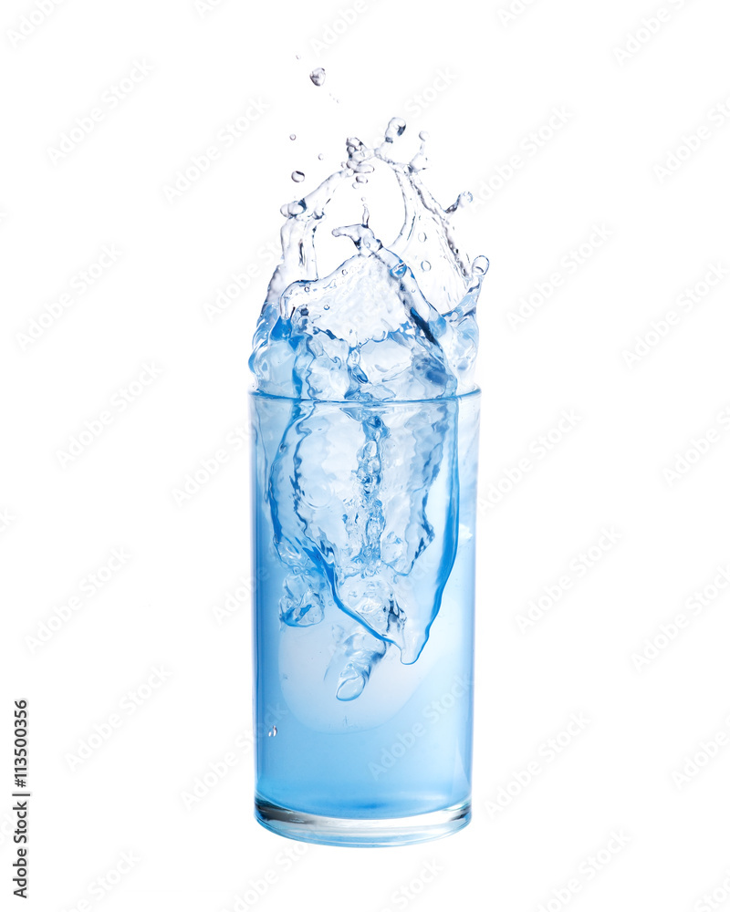 Water splashing out of a glass., Isolated white background. Water splashing out of a glass., Isolated white background.