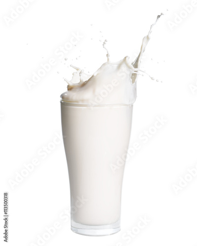 Splash of milk from the glass on a white background.